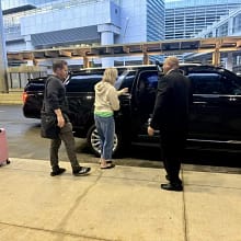 Black SUV limousine parked in downtown Chicago