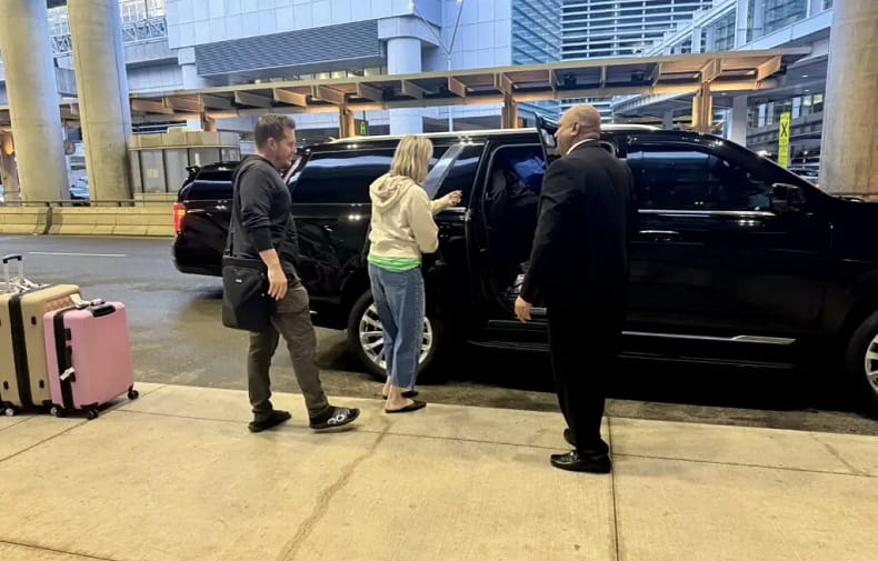 Black SUV limousine parked in downtown Chicago